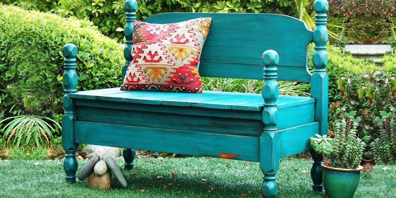 Upcycled garden bench made from an old bed