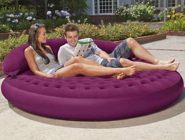 couple on an air mattress lounge